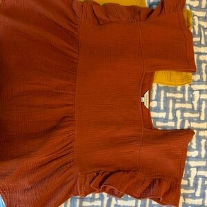 Two Lucky Brand gauze tops.